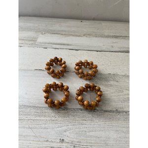 Set of four napkin rings made with wooden balls